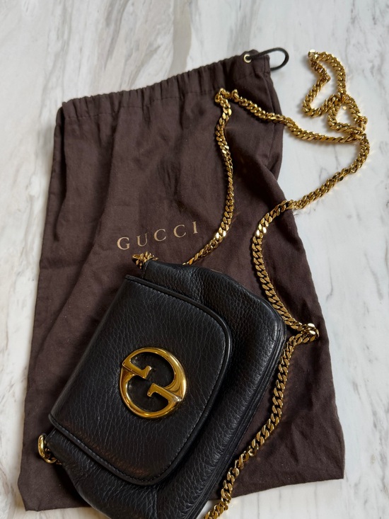 Gucci Handbags - Gucci Black Pebbled Leather Crossbody with Gold GG Hardware